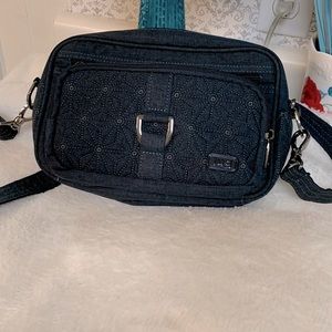 Lug carousel bag. Dark blue, lightly used.